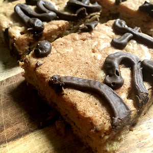 close up of cut up heart shaped cookie cake